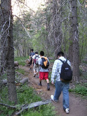 Group hiking trail into Oak Creek