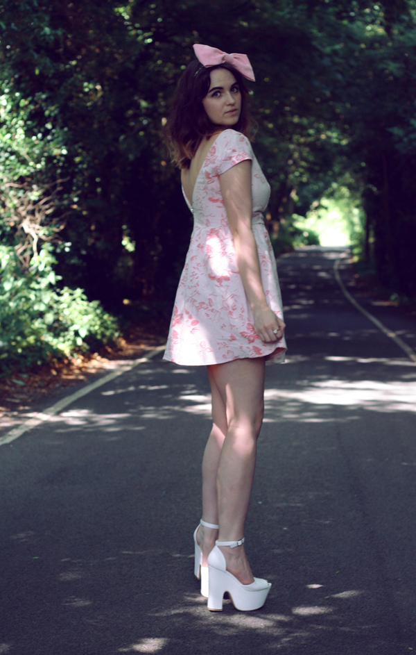 uk fashion style, dahlia fashion tapestry floral Jacquard dress styled with pink bow, vintage opal gold necklace, white platform wedges and a huge pink hair bow from roses and clementines, a tea party look, inspired by alice in wonderland, through the looking glass uk fashion style, dahlia fashion tapestry floral Jacquard dress styled with pink bow, vintage opal gold necklace, white platform wedges and a huge pink hair bow from roses and clementines, a tea party look, inspired by alice in wonderland, through the looking glass