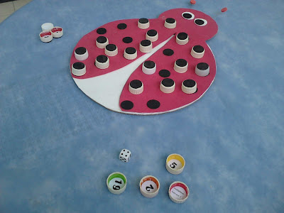 Jogo da Joaninha com tampinhas de refri Jogo para trabalhar operações matemáticas