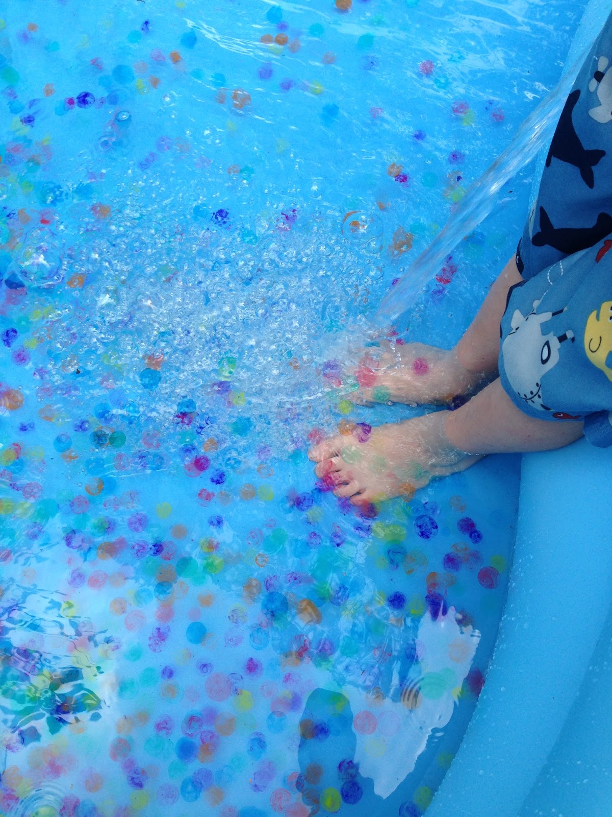 Swimming with water beads Homeschool and Light Tables
