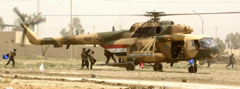 روسيا تسلم العراق مروحيات Mi-171SH جديده  Iraqi+special+operations+forces+troops+board+an+Mi-171+helicopter+with+a+simulated+insurgent+during+Exercise+Lion%25E2%2580%2599s+Leap++%252811%2529