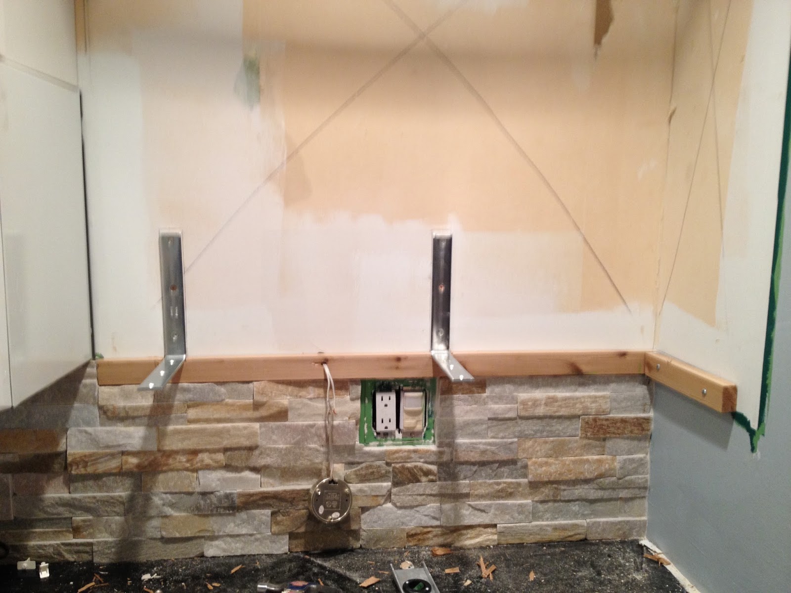 Kitchen cabinet shelf brackets cabilighting through the new wood bracket. The metal L brackets