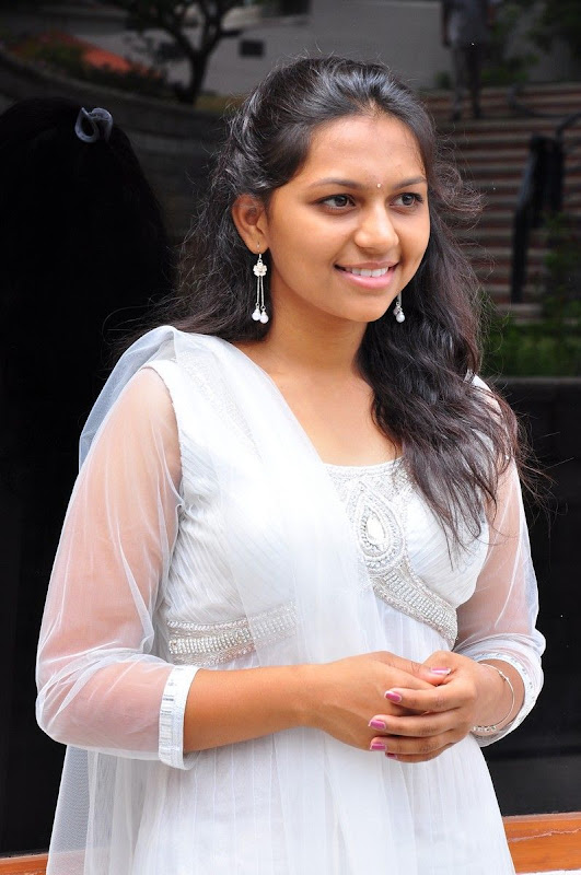 Sri  New Telugu Heroine PicsPhotos white dress navel show