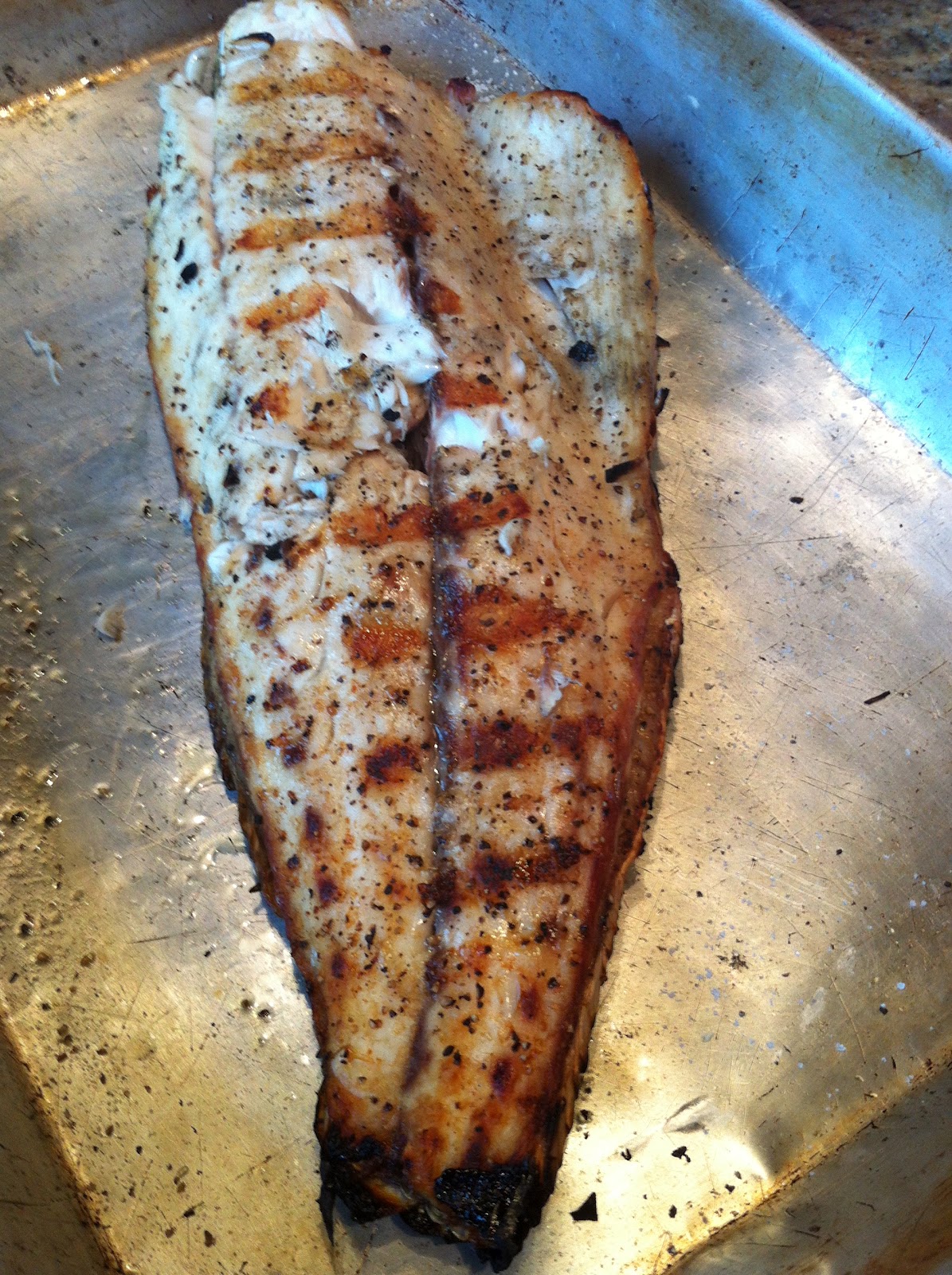 Chef Julia Redfish on the halfshell with grilled corn and ginger herb dressing