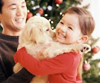 Little girl hugging puppy 