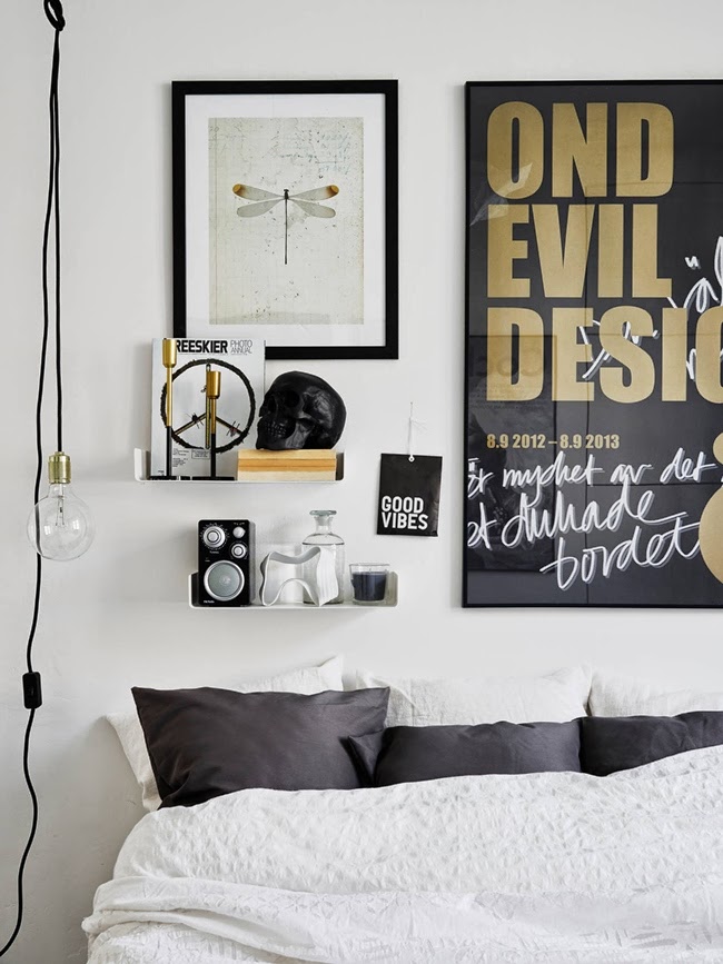 Dormitorio en negro y oro . La Garbatella diseño de interiores