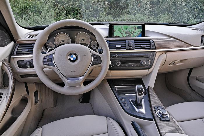 bmw 3 series interior. But the true genius of the 3-series lies in its