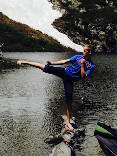 Kids karate classes Karate kid doing a sick kick near a lake