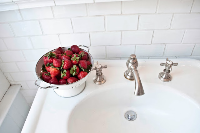 A Model Wedding, still life of strawberries on display