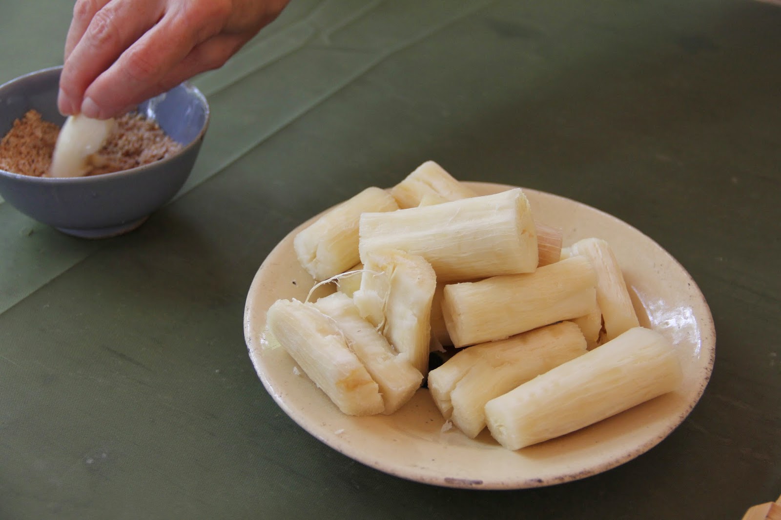 Steamed cassava root and ground peanuts for a snack. Steamed cassava root and ground peanuts for a snack.