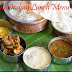 South Indian Lunch Menu 24 - Paruppu Urundai Mor Kuzhambu, Kalyana Rasam, Bittergourd Stir-Fry, Dal with ghee, Curd and Papad
