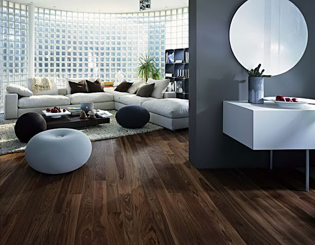 sleek laminate floor plus white bathroom and living room interiors feats round mirror also balck partition idea