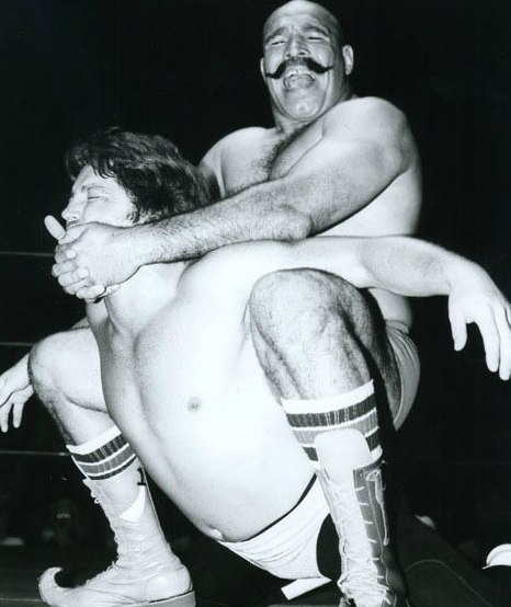 I’s IRON SHEIK, with crippling Camel Clutch.