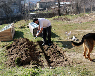Digging out the trench ready for the raised bed Digging out the trench ready for the raised bed