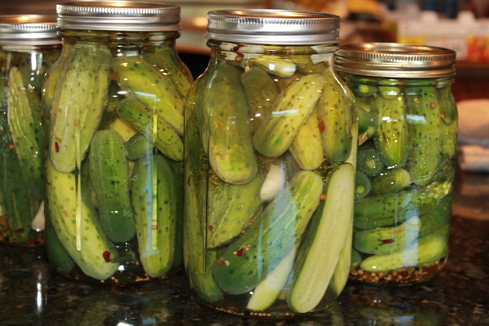 Pickles soaking in their jars. r/pics