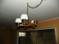 Outdated light fixture Pensacola rental home Yield a higher sales and rental price with an updated home!