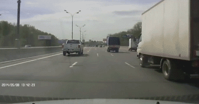 tire+hits+car+in+the+middle+of+the+road+