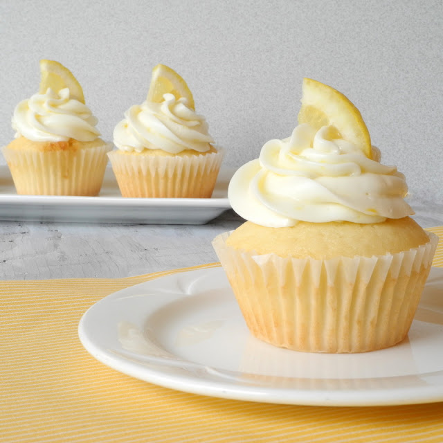 Raspberry Filled Lemon Cupcakes