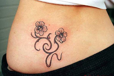 lower back flower tattoo designs