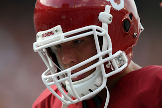 Quarterback Sam Bradford #14 of the Oklahoma Sooners walks off the field after a 35-45 loss against the Texas Longhorns during the Red River Rivalry at the Cotton Bowl on October 11, 2008 in Dallas, Texas. (October 11, 2008 - Source: Ronald Martinez/Getty Images North America)