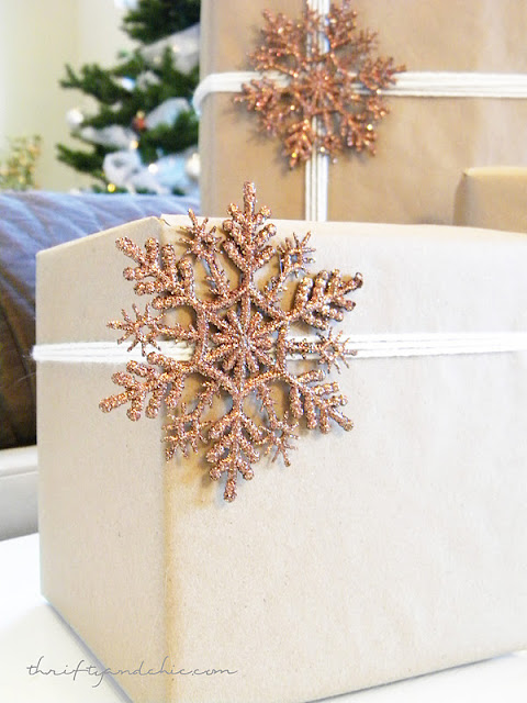 neutrally wrapped presents with kraft paper and yarn