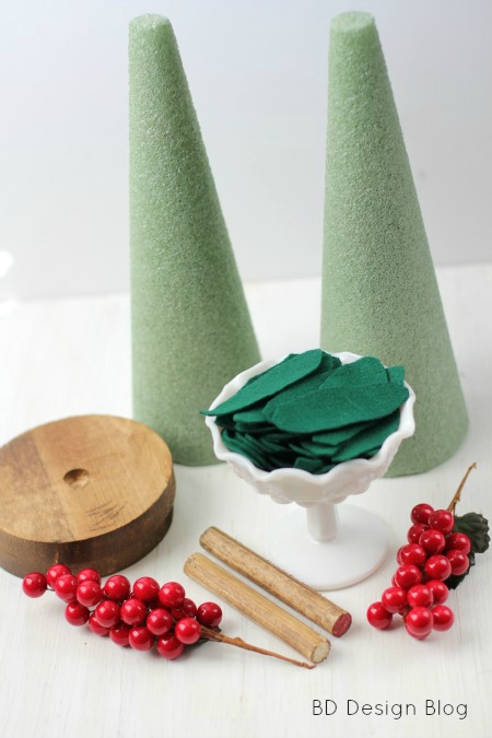 1 stain your wood dowels and wood bases with a dark stain of your choice drill a hole in the center of the base for the dowel to fit inside of - Diy Felt Christmas Tree 1 stain your wood dowels and wood bases with a dark stain of your choice drill a hole in the center of the base for the dowel to fit inside of - Diy Felt Christmas Tree