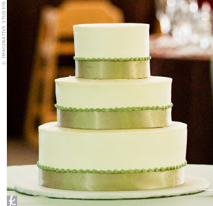 wedding cake with green ribbon detail
