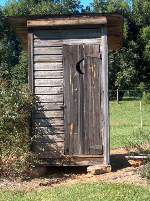 obama picture on outhouse door obama picture on outhouse door