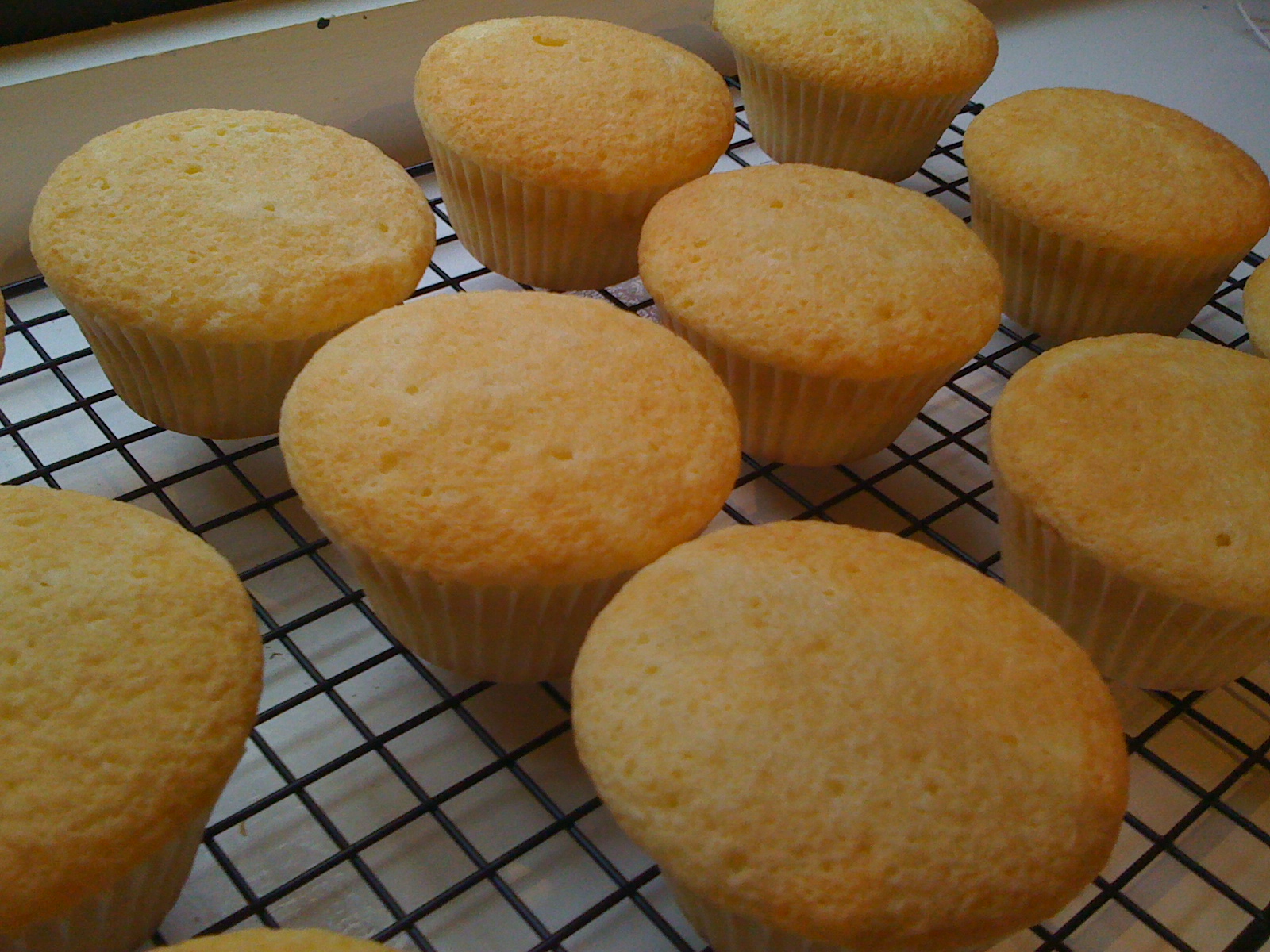 the girl with the baked goods White Cupcakes with Strawberry Puree