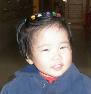 [10myleemarch08smiling_jpg_w300h309.jpg]