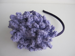 Purple flower headband $7