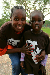 Aid Sudan 5k Race. One of the Sudanese woman with her little girl