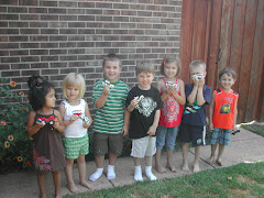 The birthday gang displaying their Lego cars they made