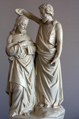 Small statue of John the Baptist baptising Jesus