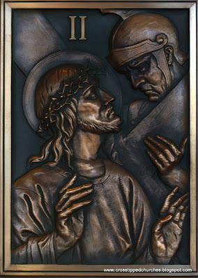 Bronze relief of sation 2 of the Stations of the Cross.
