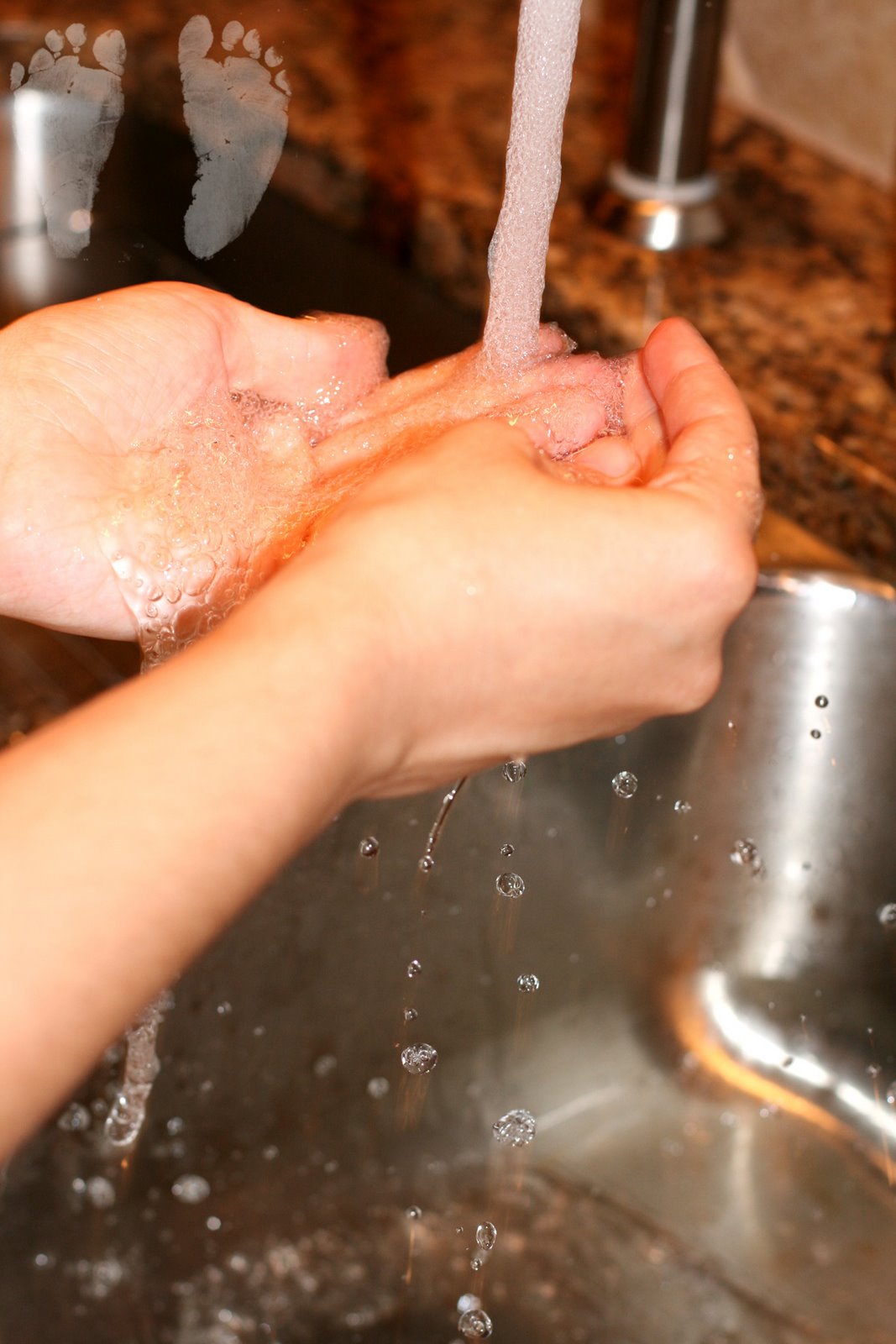 [Water+and+hands+copyright.jpg]