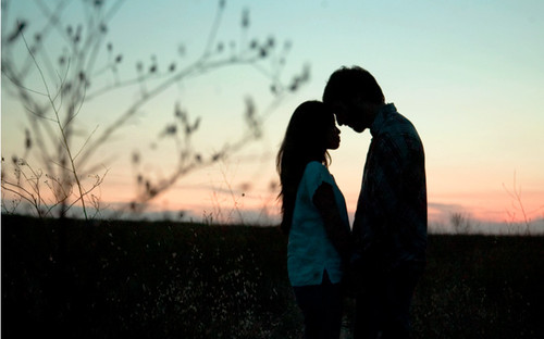 couple kissing silhouette image. couple kissing silhouette