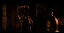 Beowulf arrancando el brazo a Grendel