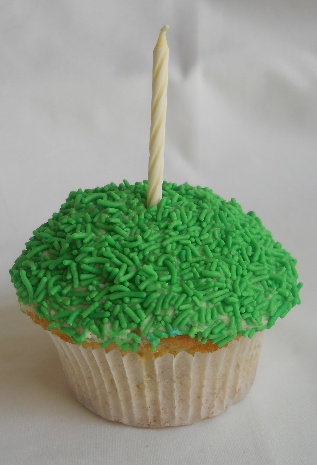 Sprinkles and Sparkles Green Sprinkle cupcake