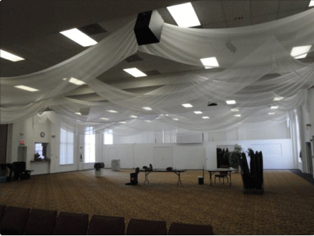 It was a very large and open space and our ceiling draping added just the It was a very large and open space and our ceiling draping added just the