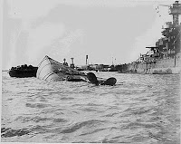Stern view of the capsized battleship USS Oklahoma