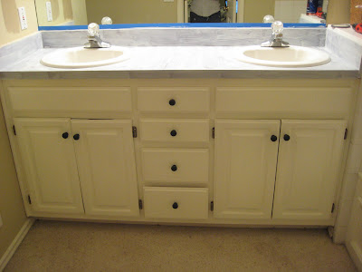 Lightly sand the counters. And then wipe them again so no dust is left ...