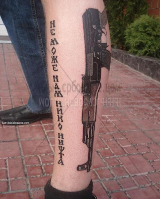 ak47 on leg tattoo