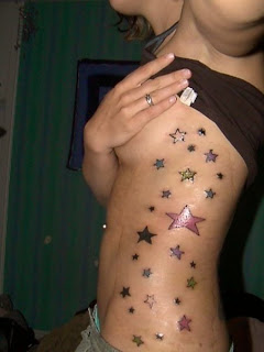 Womens+tattoos+on+sides+of+body