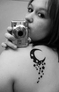 flower tattoo upper back tattoo pictures with star tattoo designs flower tattoo upper back tattoo pictures with star tattoo designs
