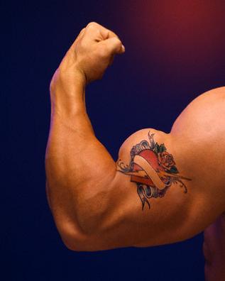 muscle tattoo. Rose Heart Tattoos.