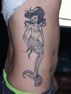 Womens+tattoos+on+sides+of+body