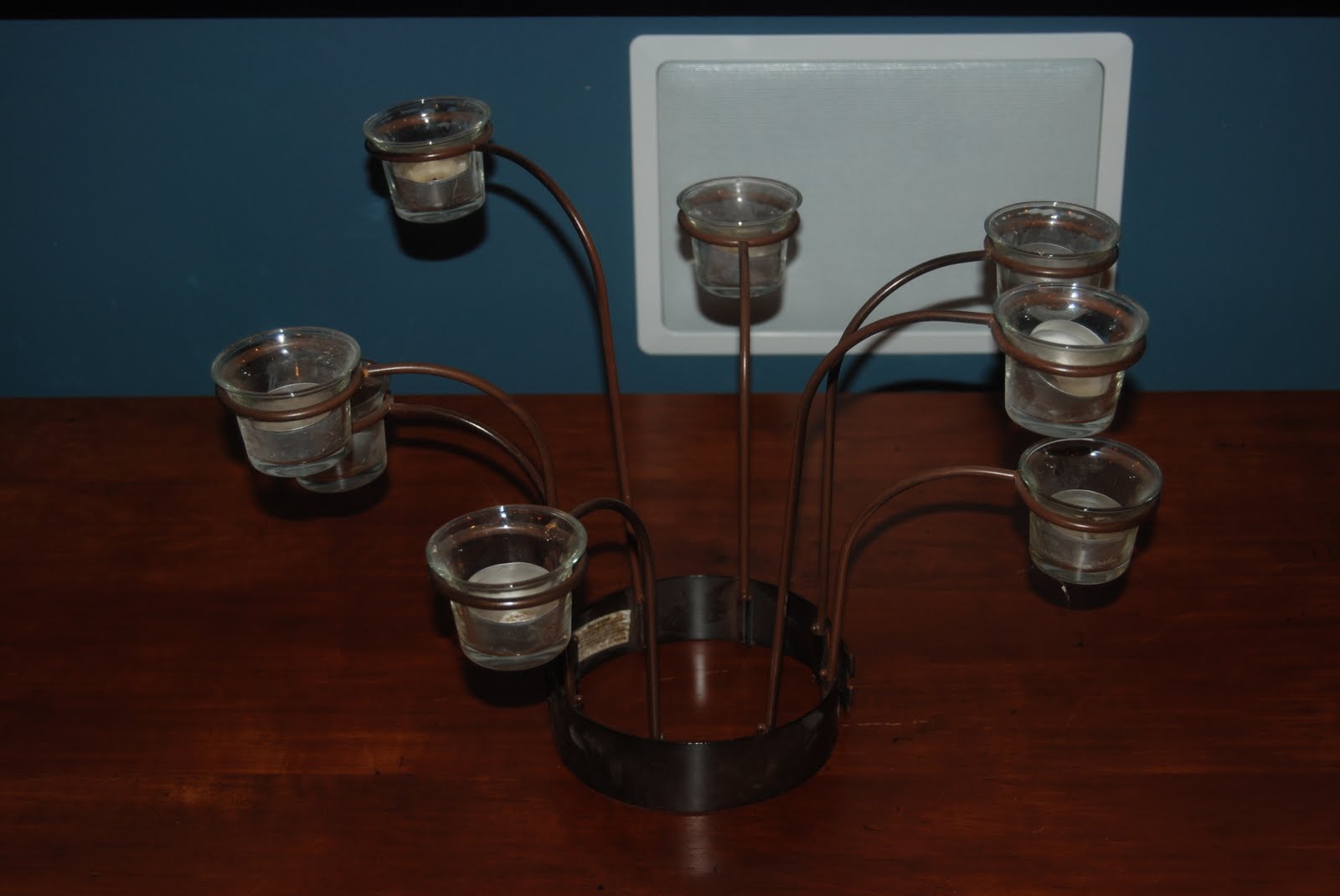 The Delp's "Yard sale" Votive candle holder for around an outside