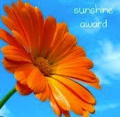 http://4.bp.blogspot.com/_0u752OuXUAM/S844jVG2-_I/AAAAAAAAA9E/RCyNkVj42lU/s1600/sunshine+award.bmp