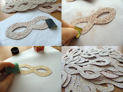 sanding and sponging the masks